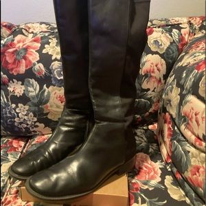 Tall Black flat heel boot with stretch back leg for wider calf.